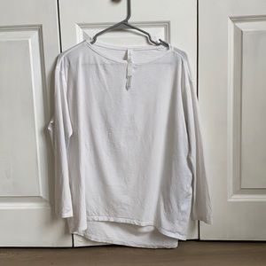 White Lululemon long sleeve. Worn once and washed